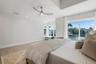 Primary bedroom with sliding doors to the outside patio