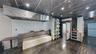 Basement with a wall mounted air conditioner
