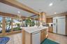 KITCHEN - notice the extra seating space by the windows! Full length mirror, room for imagination here!