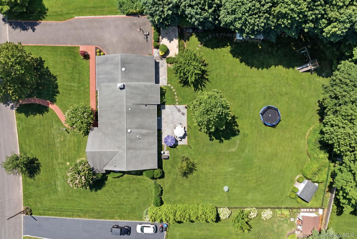 Shy of an acre, this property is flat and fully fenced.