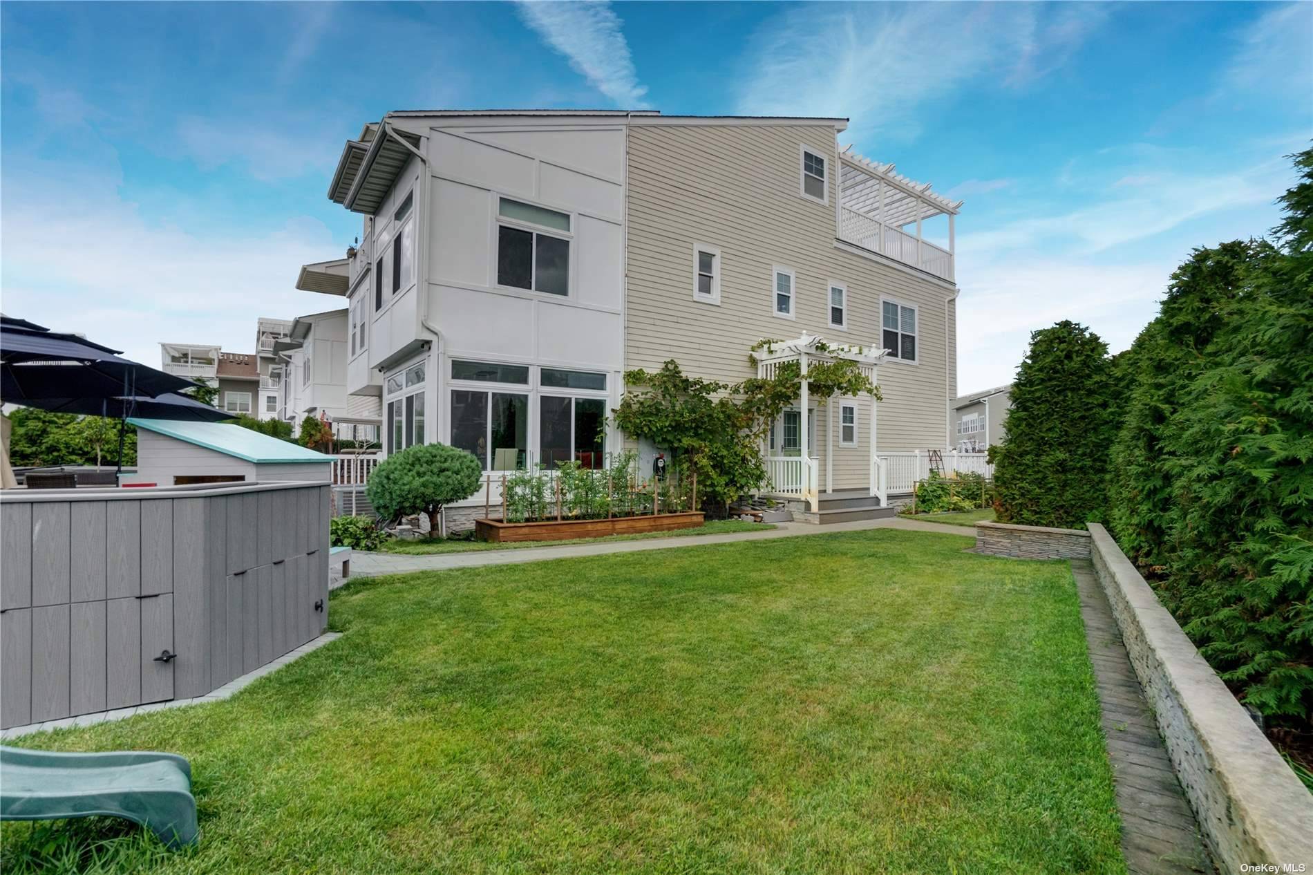 Beautifully remodeled with a show stopping list of updates, this spectacular Arverne by the Sea multi family home is a smart, modern haven that's sure to impress !
