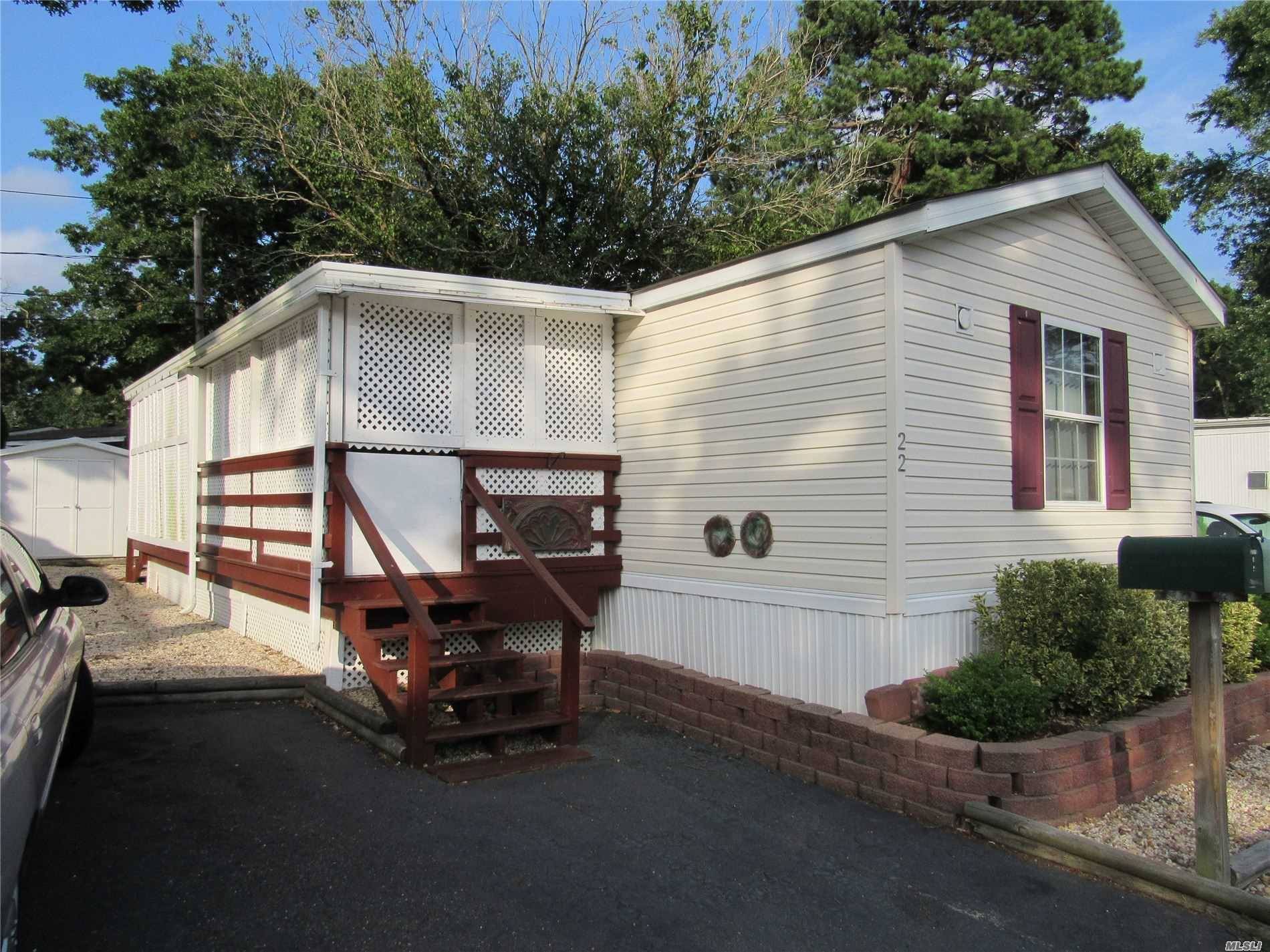 Well maintianed 2 bedroom home with enclosed porch, center living with bedrooms in front and back.