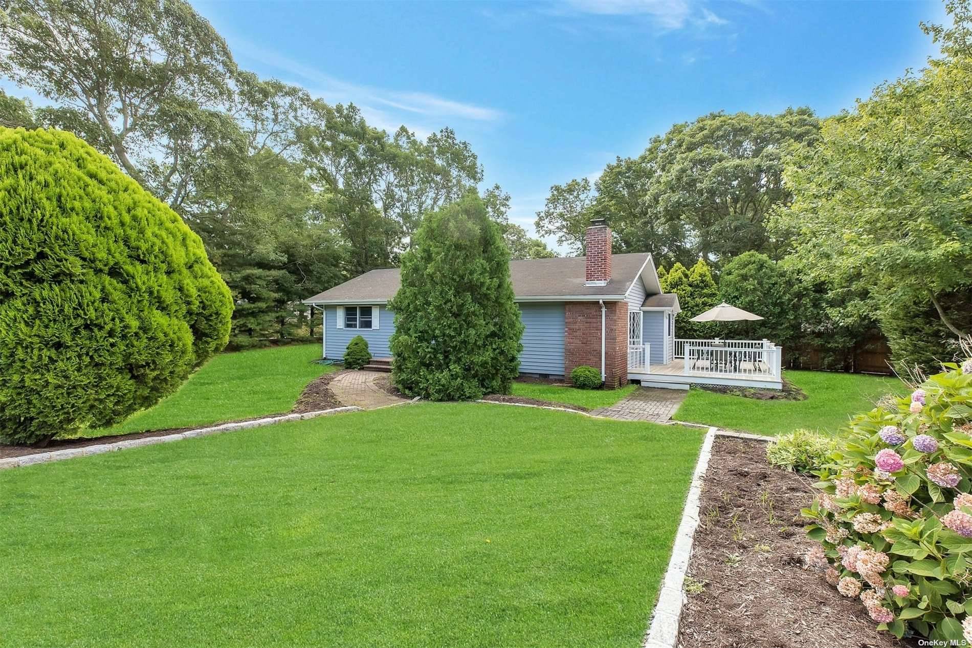 Adorable ranch style home on a very desirable road south of the highway in Hampton Bays.