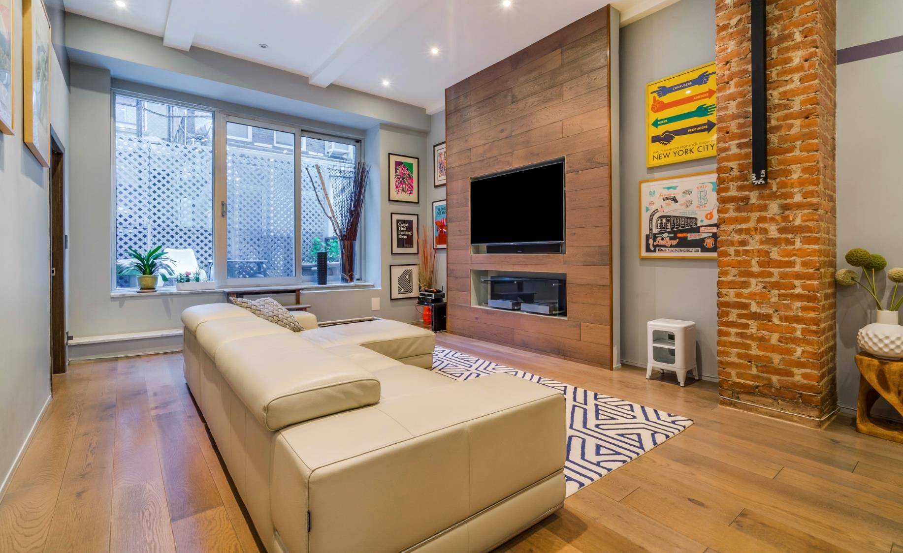 Live in the Flatiron's only custom renovated two bed loft with private outdoor space and a fireplace.