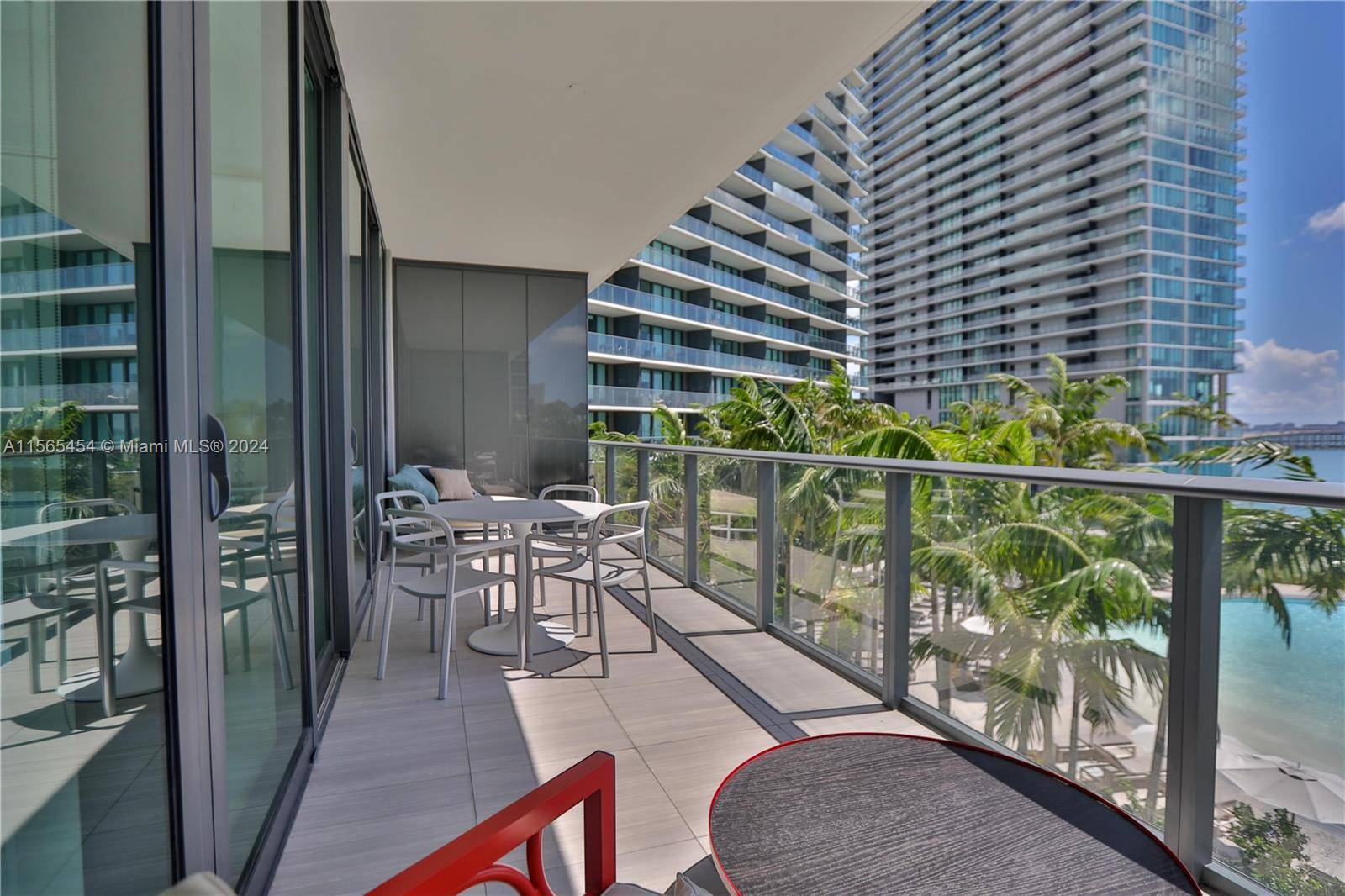 Enjoy direct waterfront views from this stunning 2 bedroom den, 2 bath flow through residence with semi private elevator.