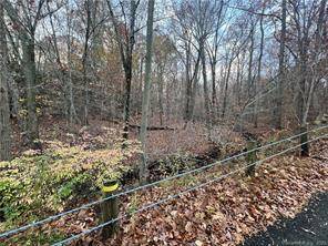 Undeveloped, residential land approved for a single family for sale at 490 Grassy Hill Rd !