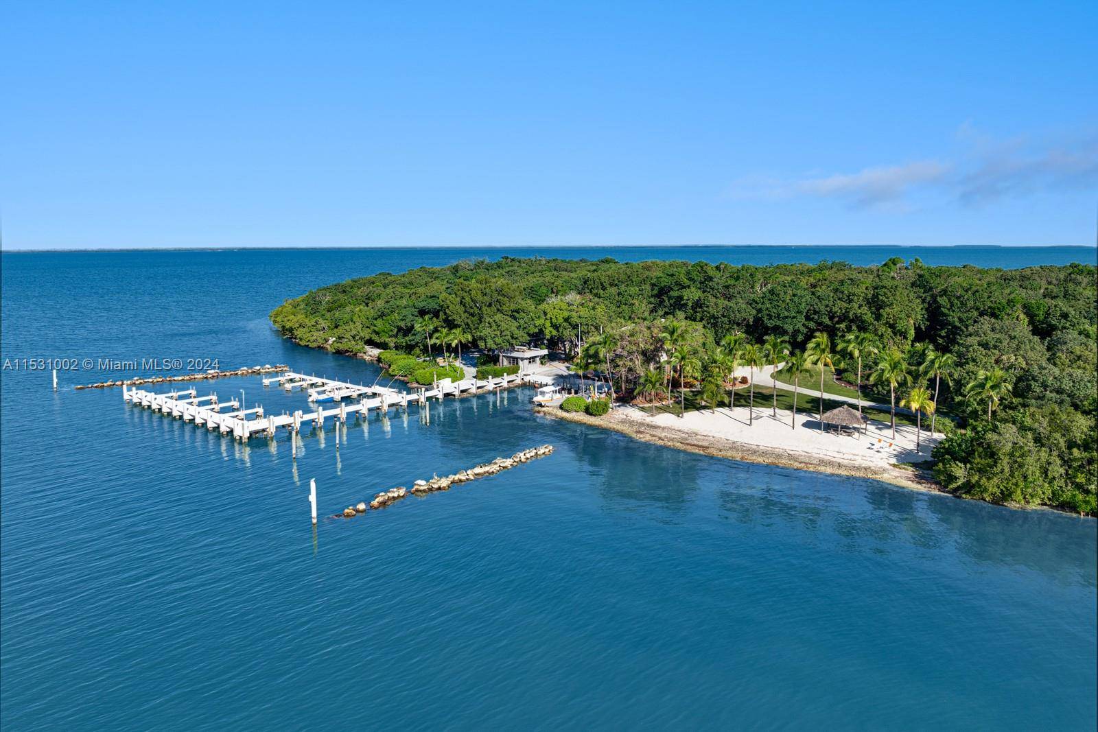 Nestled amidst the waters of the Florida Keys, an unparalleled opportunity awaits your very own 26 acre Private Island plus an additional waterfront mainland home within Ocean Reef Club.