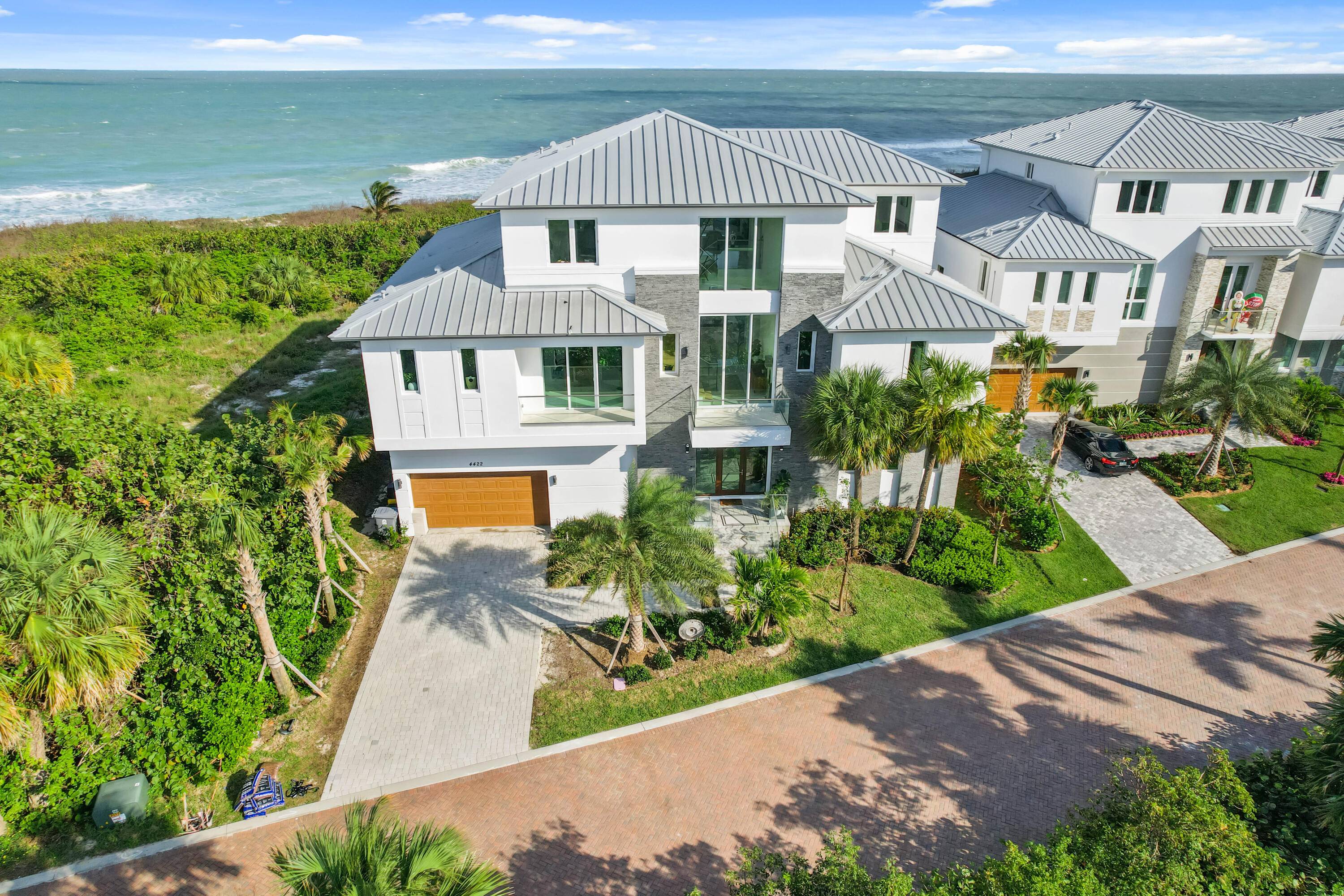 Indulge in coastal luxury with this newly built in 2022, over 10, 250 tot sq', oceanfront retreat in the Aquavista community of North Hutchinson Island.