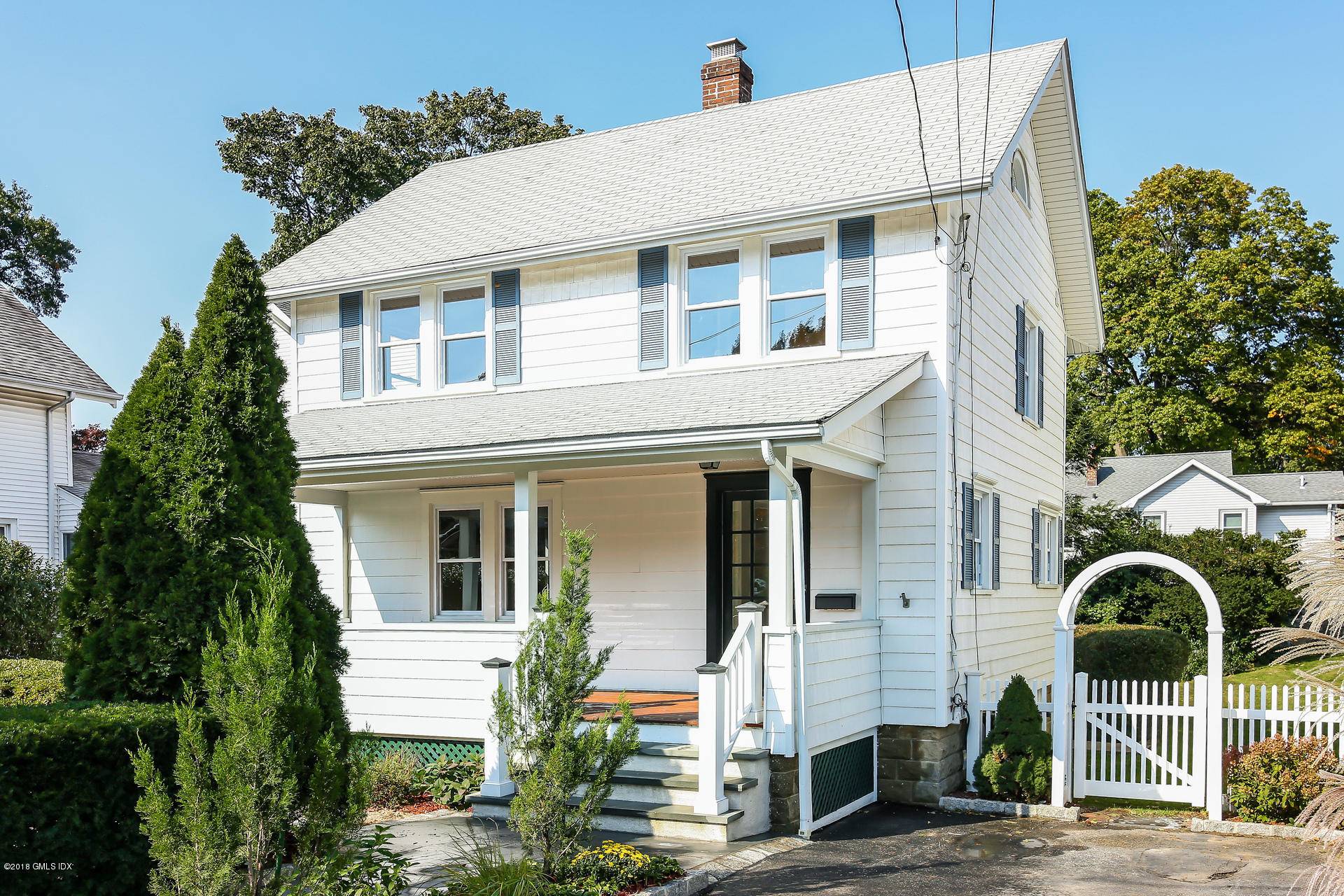 ABSOLUTELY CHARMING, SUN DRENCHED, TOTALLY AND TASTEFULLY RENOVATED 1920'S SHORE COLONIAL WITH PRIVATE OVERSIZED REAR YARD WITH SWEEPING LAWN.