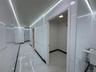 Corridor with marble finish floor and visible vents