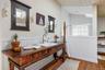 Bespoke antique vanity with oversized steam shower