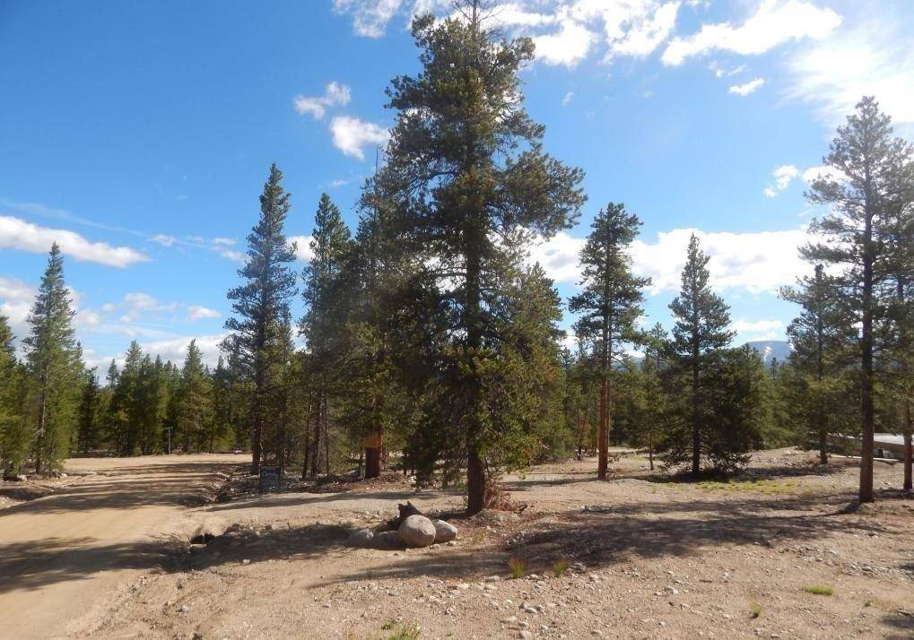 Beautiful flat lot with lots of trees and views.