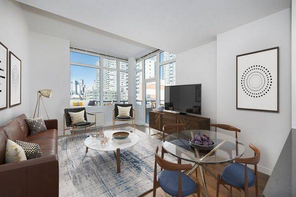 Spacious 1 bedroom with floor to ceiling corner living room windows, a windowed kitchen with stainless steel appliances, stone counters, and eating bar.