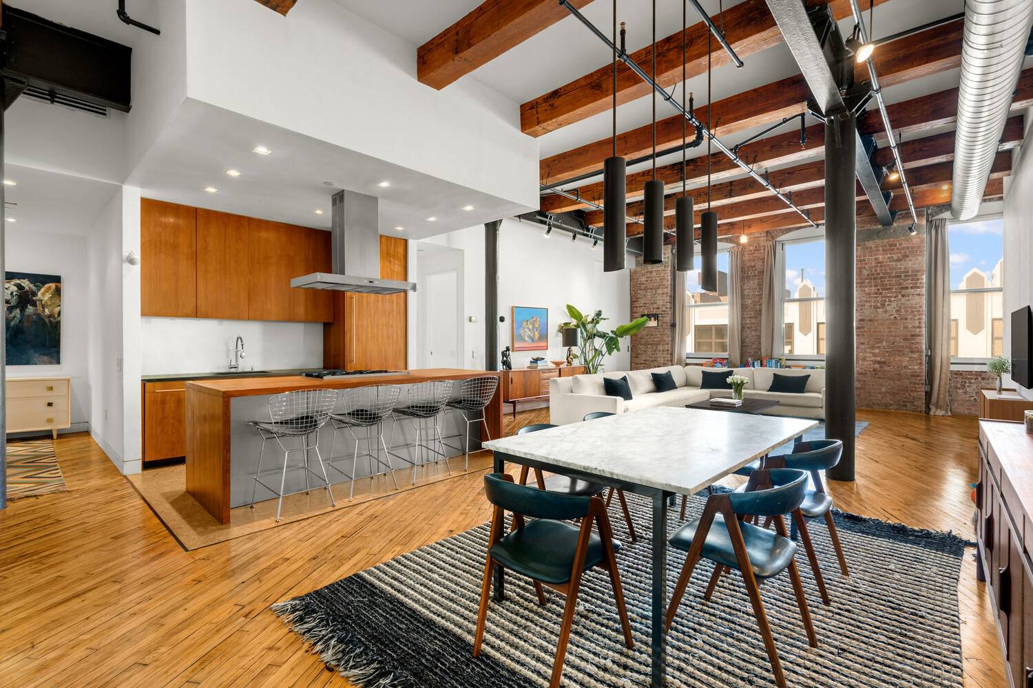 Massive, sun flooded and gorgeously renovated 1800sf loft at the Mill Building ; Williamsburg's premier loft condominium.
