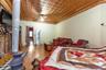 Bedroom featuring crown molding and wood-type flooring