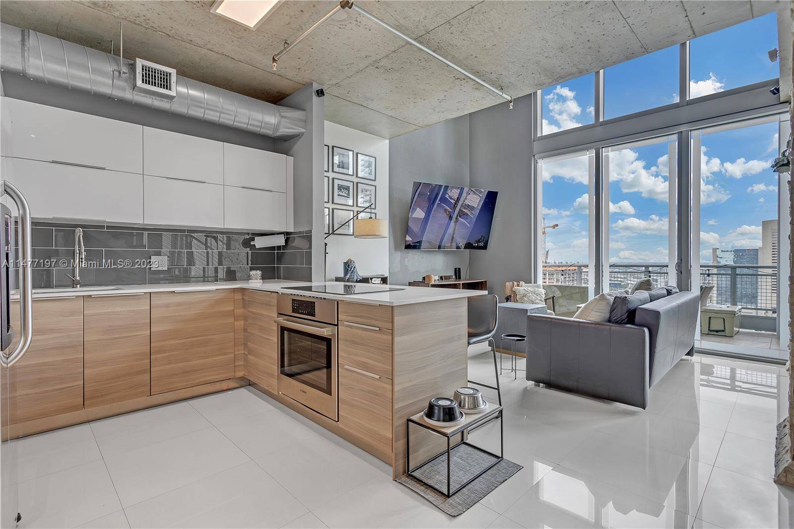 Savor city living at its finest in this stunning 2 bed, 2 bath penthouse at Neo Vertika.