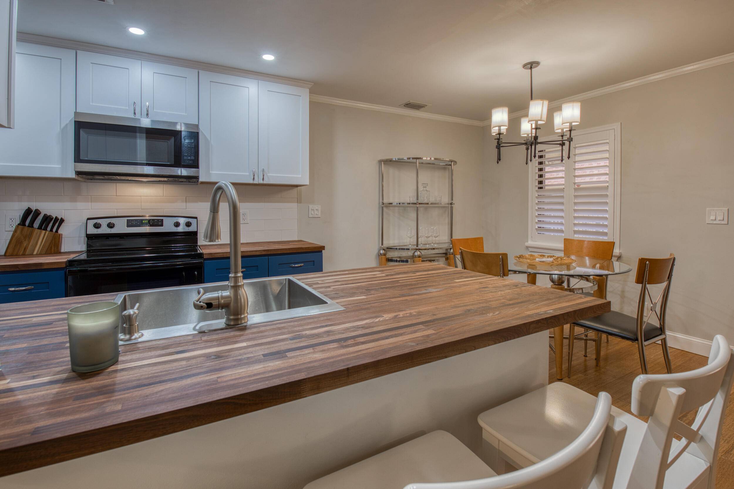 Lush and Beautiful updated 2 2 with laundry insideHugh open entertaining kitchen with dining area, living room spills onto the covered lanai and many more features to discover also plenty ...