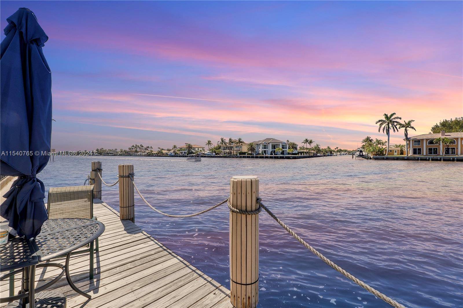 Sunset lovers dream in Moonlit Waters Co Op low key building, located directly on the waterfront of intersecting canals and the intra coastal waterways.
