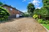Paved Portion of driveway near garage entry