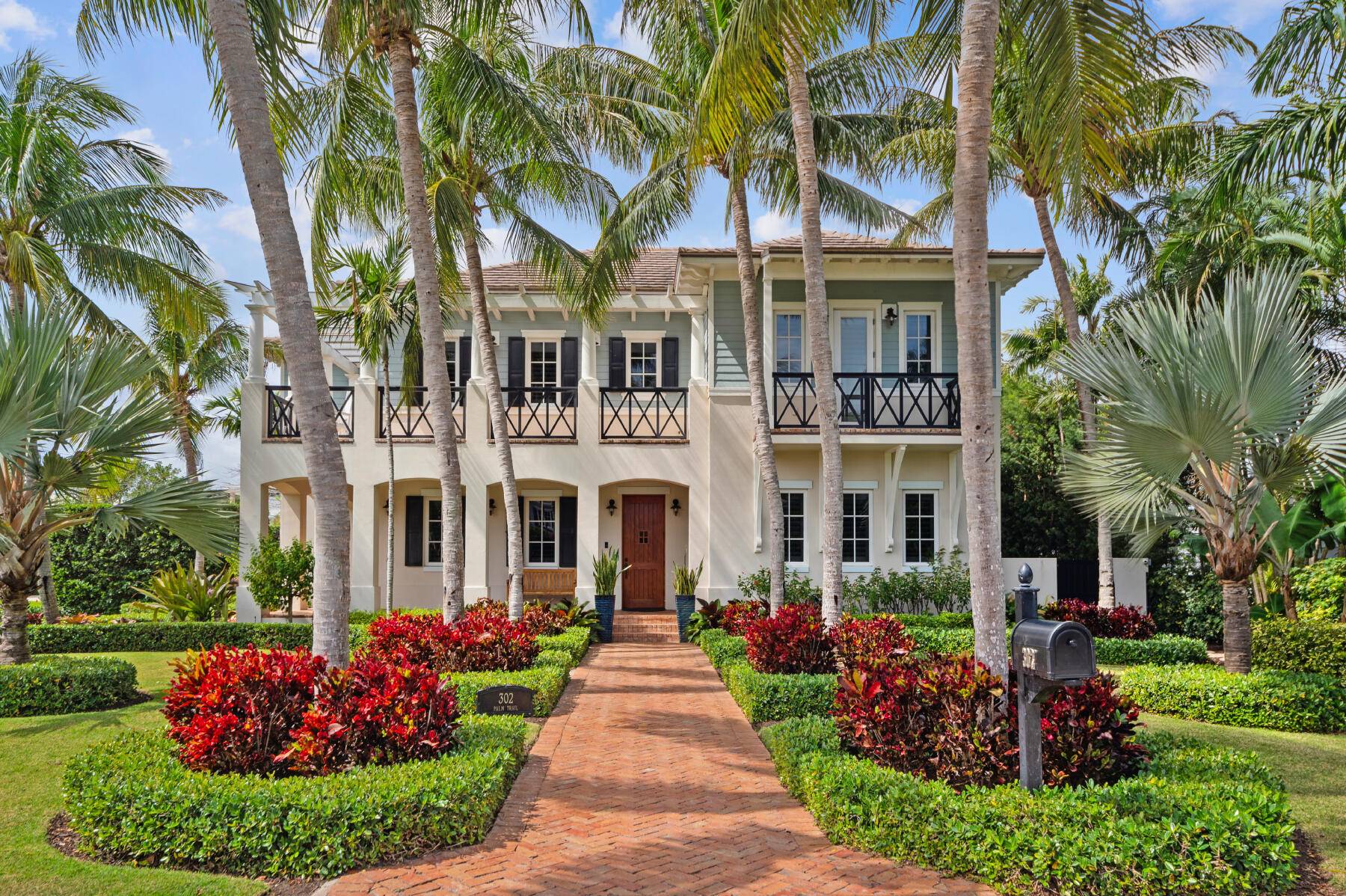 Nestled on the highly sought after Palm Trail in Delray Beach,, this British West Indies inspired gem seamlessly combines luxury and comfort with timeless appeal.