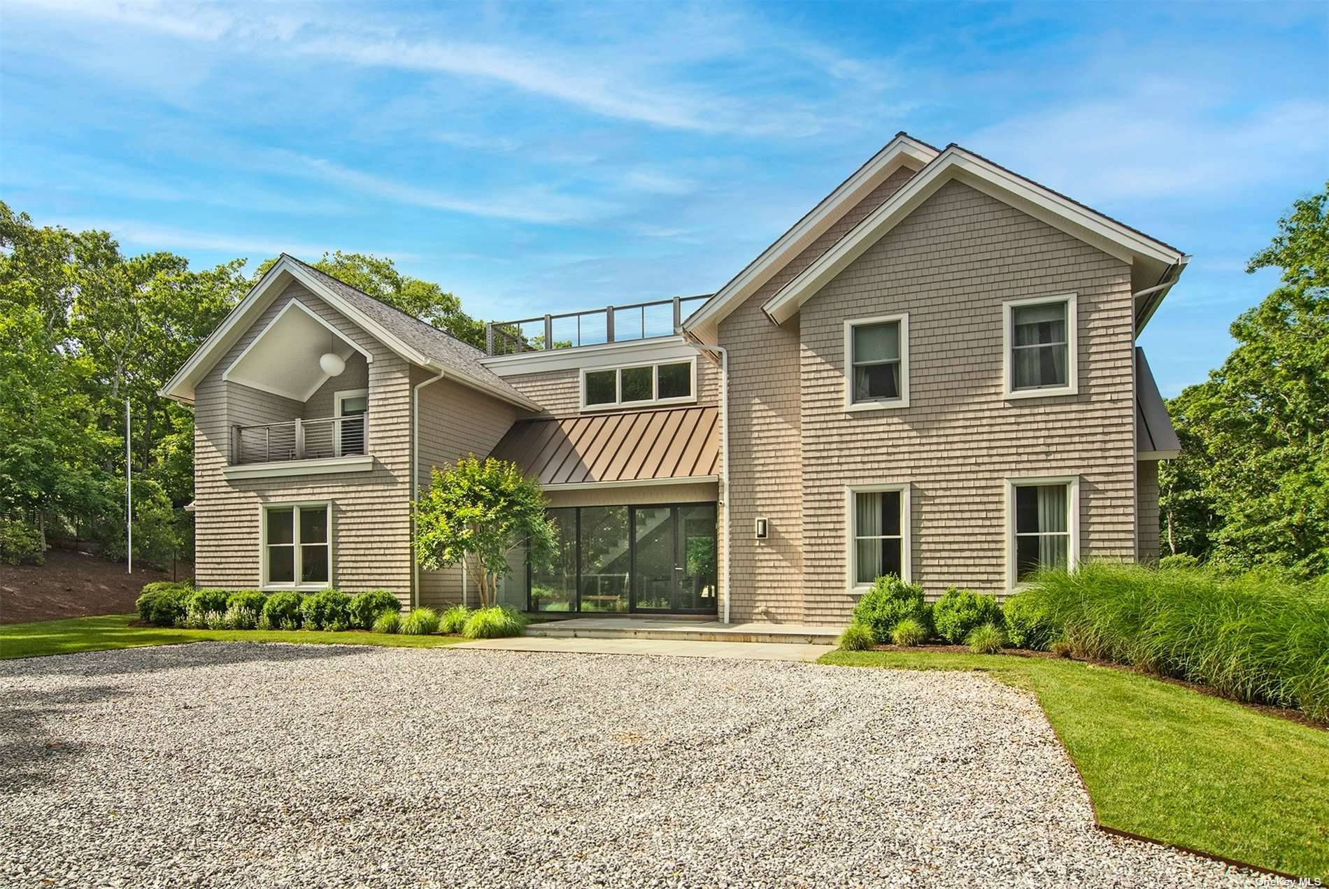 This beautiful residence is so close to the Ocean, village, and farm stands of Amagansett.