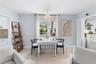 Dining Area with expandable Table to accommodate 6 - 8 people, with adorable jellyfish chandelier.