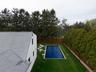 View of pool featuring a fenced backyard and a patio