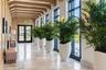Florian Park Amenities: A Welcomed Arrival. The stage is set for your much-anticipated entrance. A porte-cochere will lead to the open-air lobby, staf