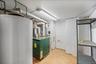 Utility room featuring water heater