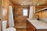 Primary bath with dual rain head shower heads