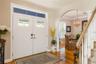 Entry foyer with partial view of formal dining room