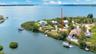 Unique oversized almost a third of an acre waterfront lot at the end of the street with private boat ramp that allows for easy access to Tampa Bay and