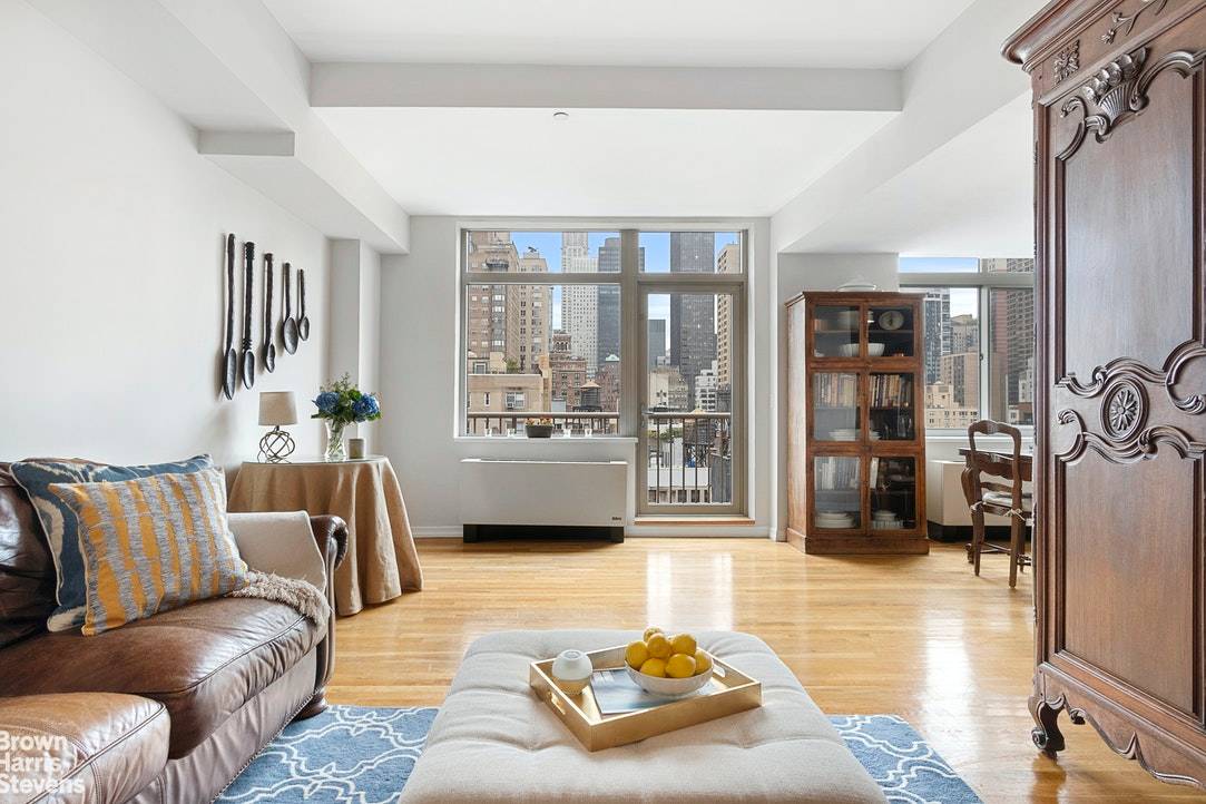This spacious two bedroom two bathroom home with a large balcony has sweeping views of midtown and the Chrysler building.