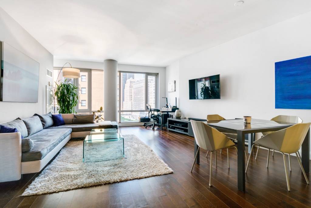 Spectacular one bedroom home featuring an open floor plan, a wall of windows and perfectly situated in the heart of Battery Park City and the New Downtown.