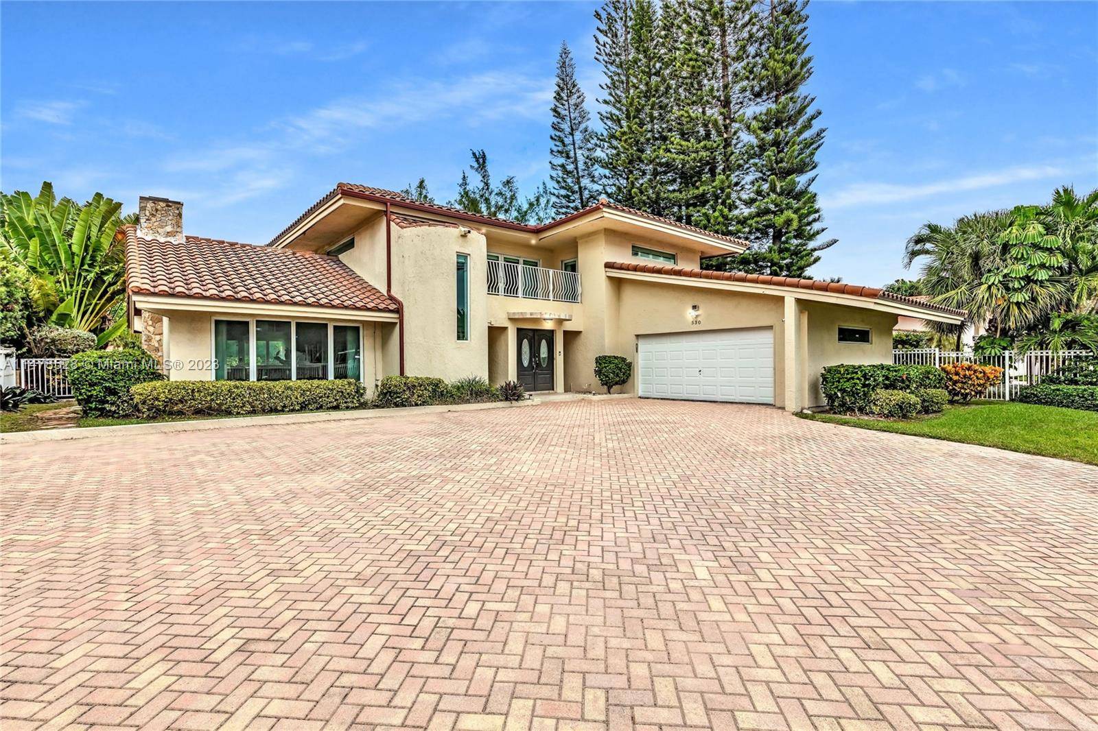 It can be yours Situated in the prestigious Golden Beach Community, this renovated contemporary home has a large and wide lot of over 12, 500 ft.