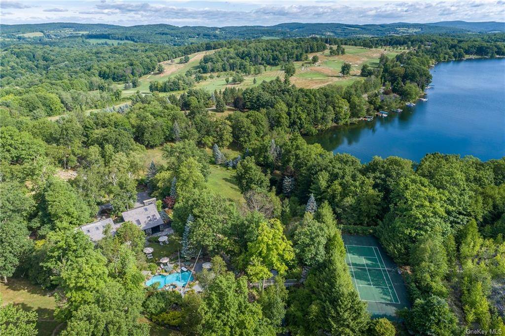 Unparalleled 134 acre estate fronted on Copake Lake and adjacent to the Copake Country Club.