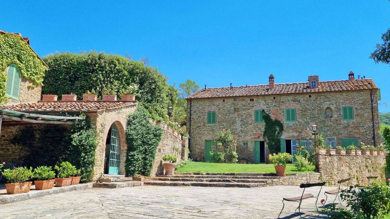 Tuscany Arezzo. For sale Ancient building complex consists of renovated farmhouse, outbuilding, annex with pool and olive grove