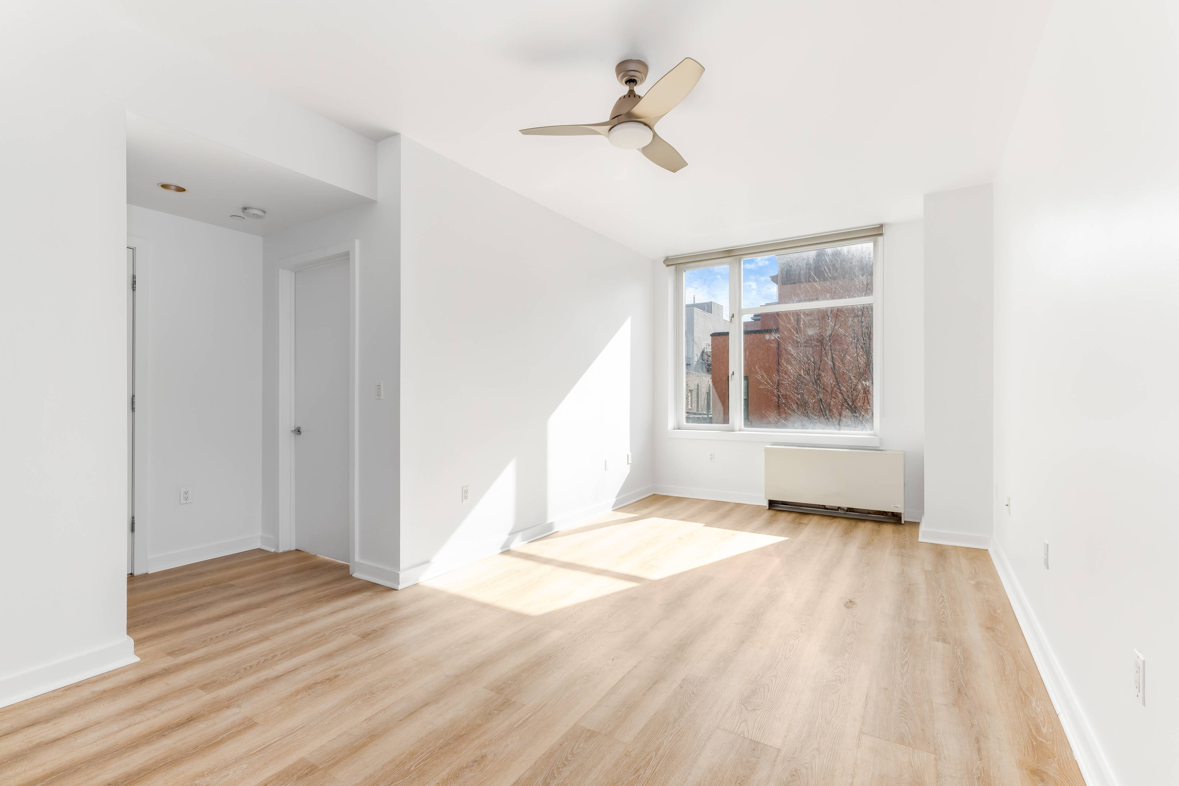 Natural light FILLS the interiors of this perfectly appointed 1 bedroom condo residence thanks to the high ceilings, lofty windows and shining white oak hardwood floors.
