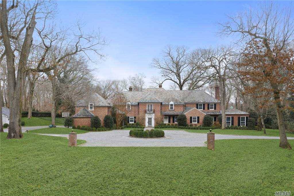 Long Driveway leads to Joie De Vivre which is a classic Brick Manor Home built by James W.