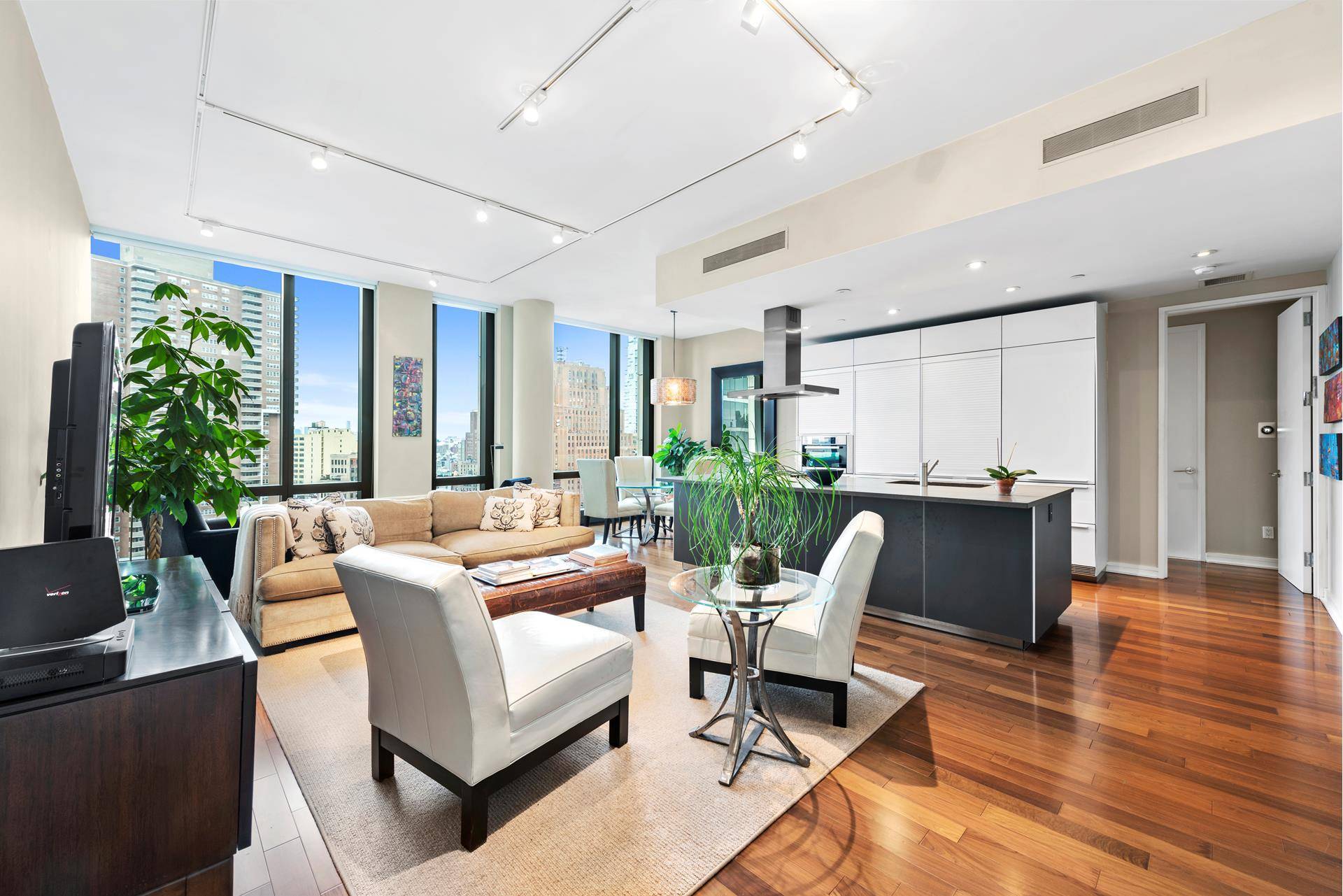 Spacious 2 bed, 2. 5 bath Tribeca apartment with grand floor to ceiling windows.