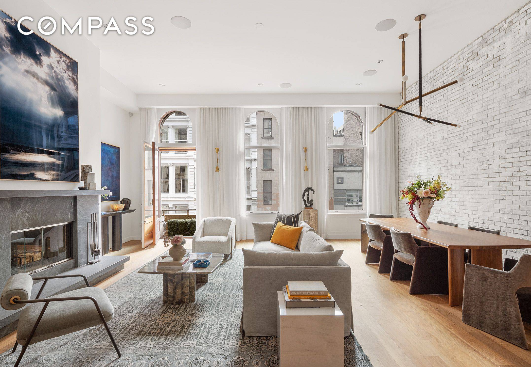 New Price ! Perfectly perched in an immaculately converted landmark 24 hour doorman condominium loft building on a quiet cobblestone block of Mercer Street in SoHo s historic cast iron ...