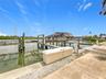 This is your boat slip that conveys with the sale & has a 10,000 lift and a dock box that also conveys.