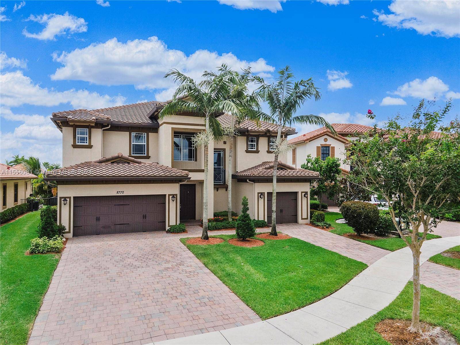 Resort style living at Parkland s prestigious gated manned community of Miralago.
