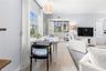 View of dining area and sunroom from Kitchen