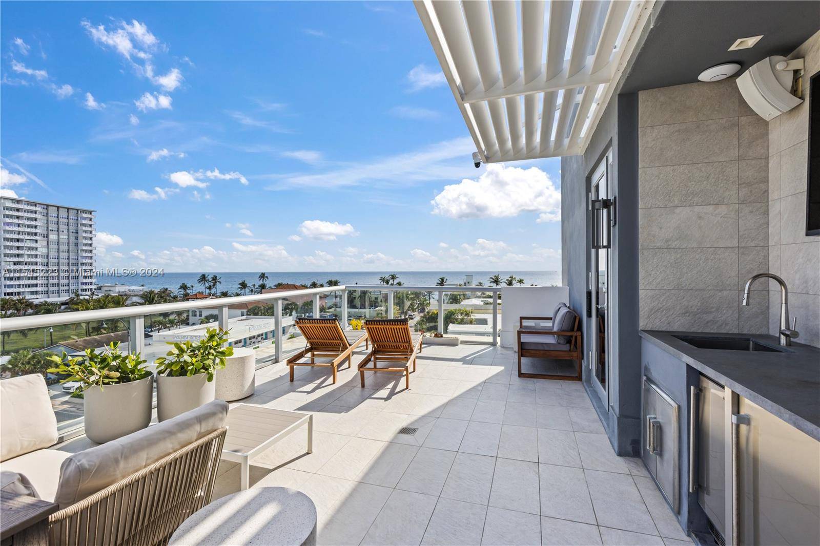 Experience the ultimate luxury living in this 5 story waterfront corner townhome, boasting a 55' foot private boat slip on the Intracoastal and steps the beach.
