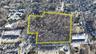 Aerial overview of property's location featuring property boundaries highlighted