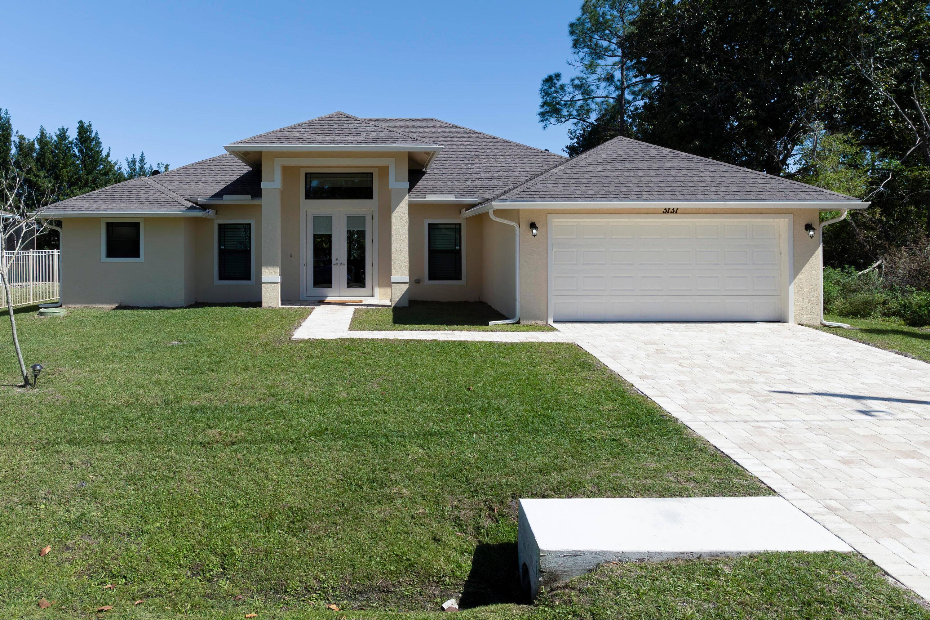 Just built 3 bed 2 bath home in PSL off Savona featuring 2, 279 Sq Ft of luxury living space.