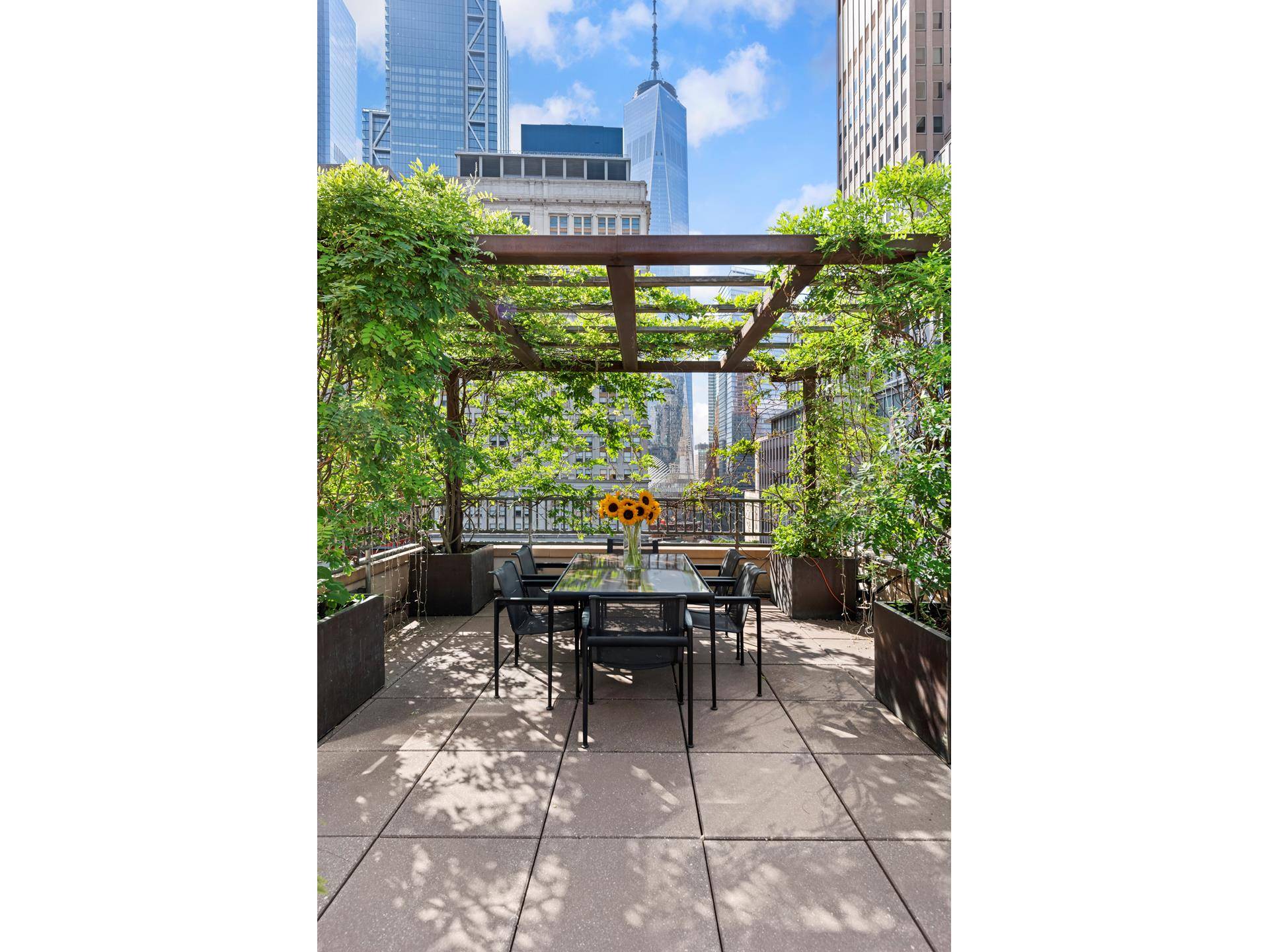 Two bedroom penthouse with a 950 square foot planted terrace located in the heart of FiDi.