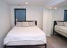 Bedroom featuring recessed lighting, wood finished floors, and a closet