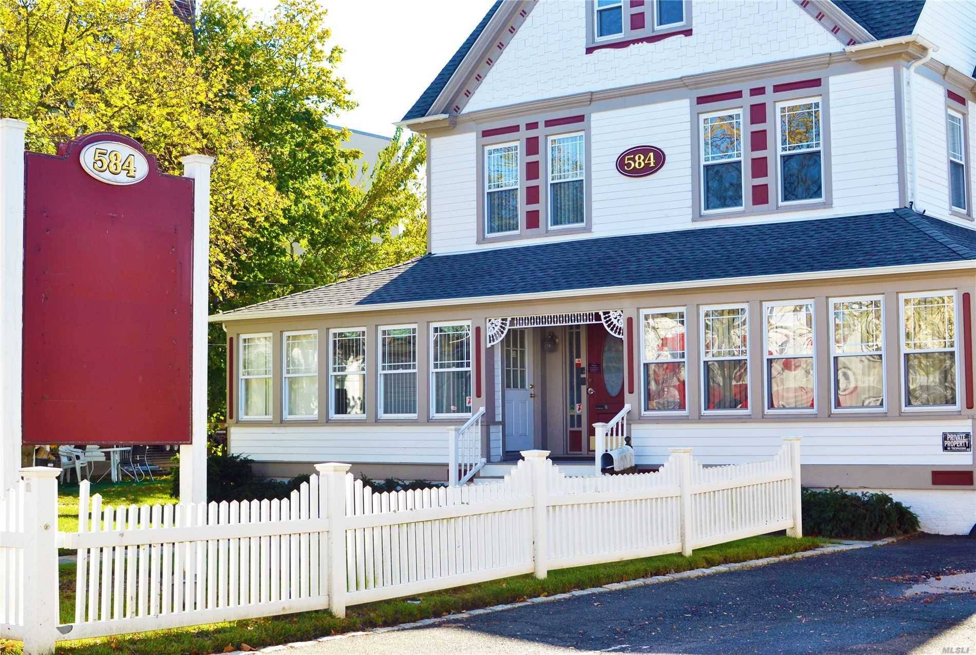 Beautiful and charming 3 story Victorian Building for rent on Main St in the heart of Islip.